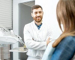 dentist talking to patient