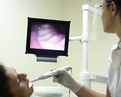 Dentist capturing intraoral photos