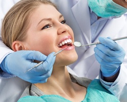 A young woman having her teeth checked