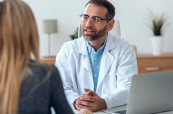 dentist talking to patient about financial options 