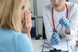 Patient listening to dentist in Weyauwega