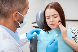 Patient talking to her dentist in Weyauwega