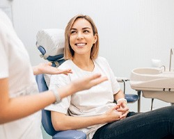 dentist talking to patient