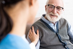 Man with failed dental implant in Weyauwega