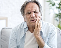 Man with tooth pain in Weyauwega