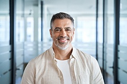 Close-up of bearded man smiling
