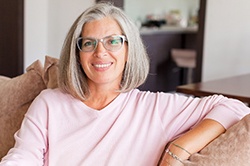 Woman smiling with dental implants in Weyauwega