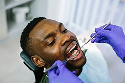 Man visiting his Weyauwega implant dentist for regular checkup