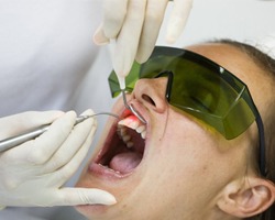 A patient receiving laser dentistry.