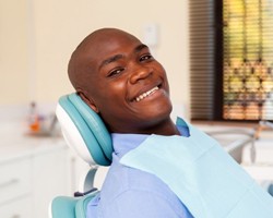 A patient smiling at his dental appointment.