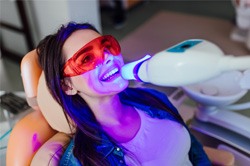 patient getting in office whitening 