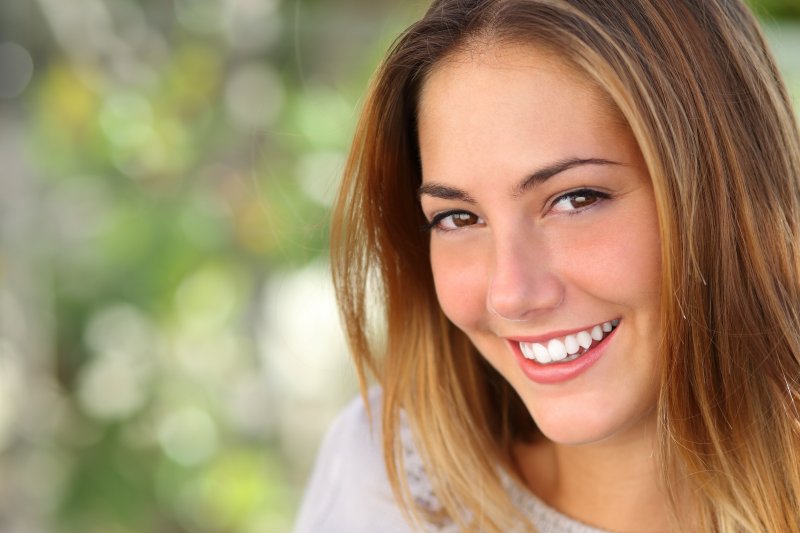 young woman with healthy smile