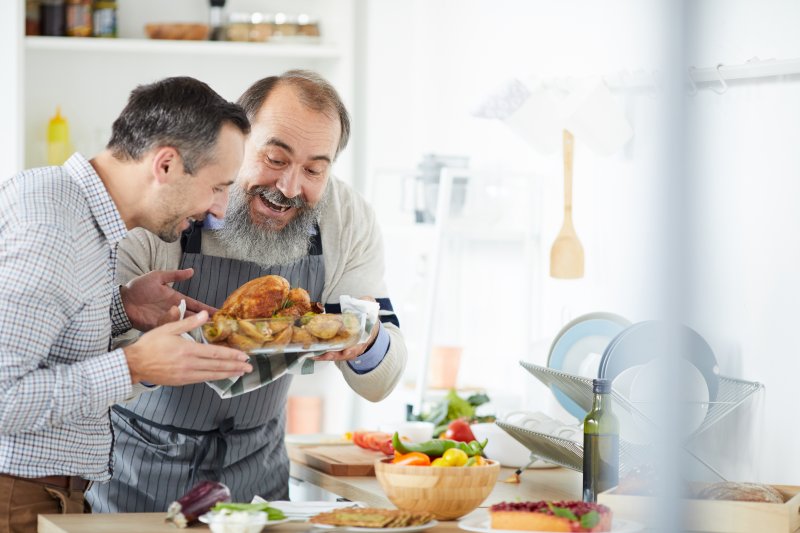 two men preparing Thanksgiving dinner