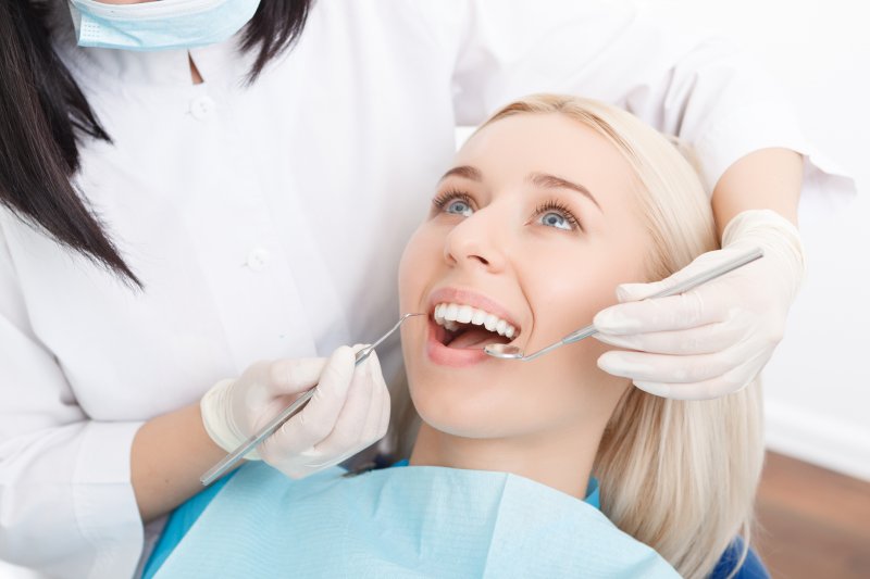 woman having her teeth checked